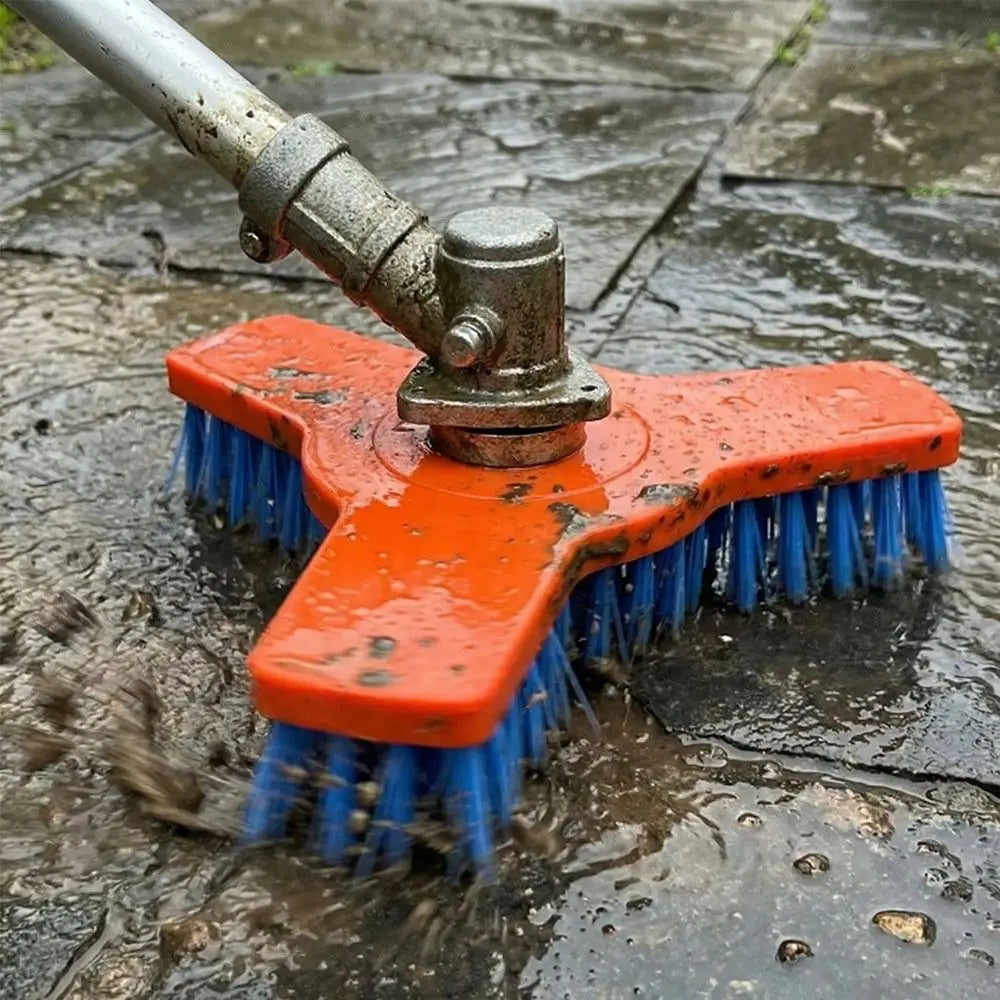 Rotary Surface Cleaning Brush attached to a power shaft while scrubbing muddy water from outdoor paving