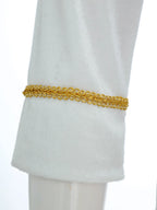 Royal Prince Costume white sleeve close-up showing the decorative gold braid around the cuff.