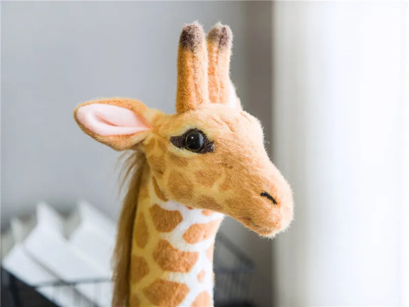 Safari Giraffe Stuffed Animal right-facing head close-up showing the eye, ears and mane.