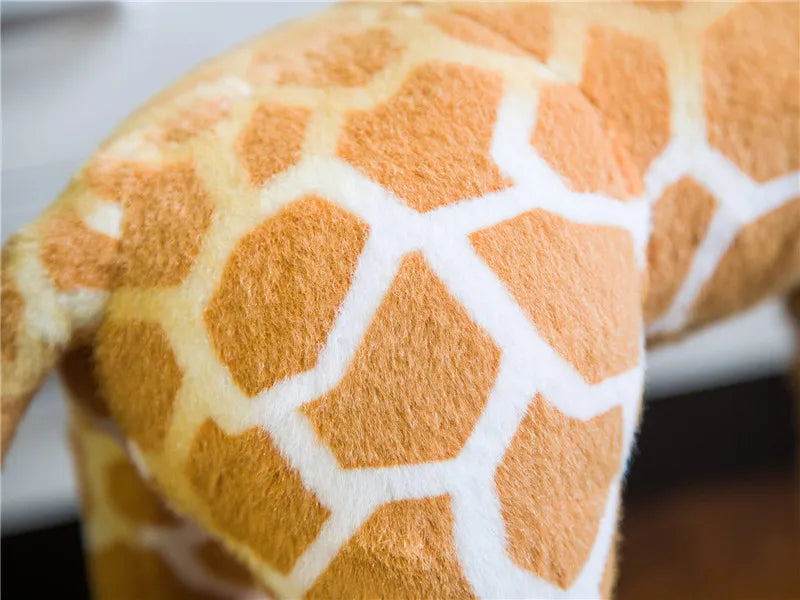 Safari Giraffe Stuffed Animal close-up of brown spots and cream lines across the plush body.