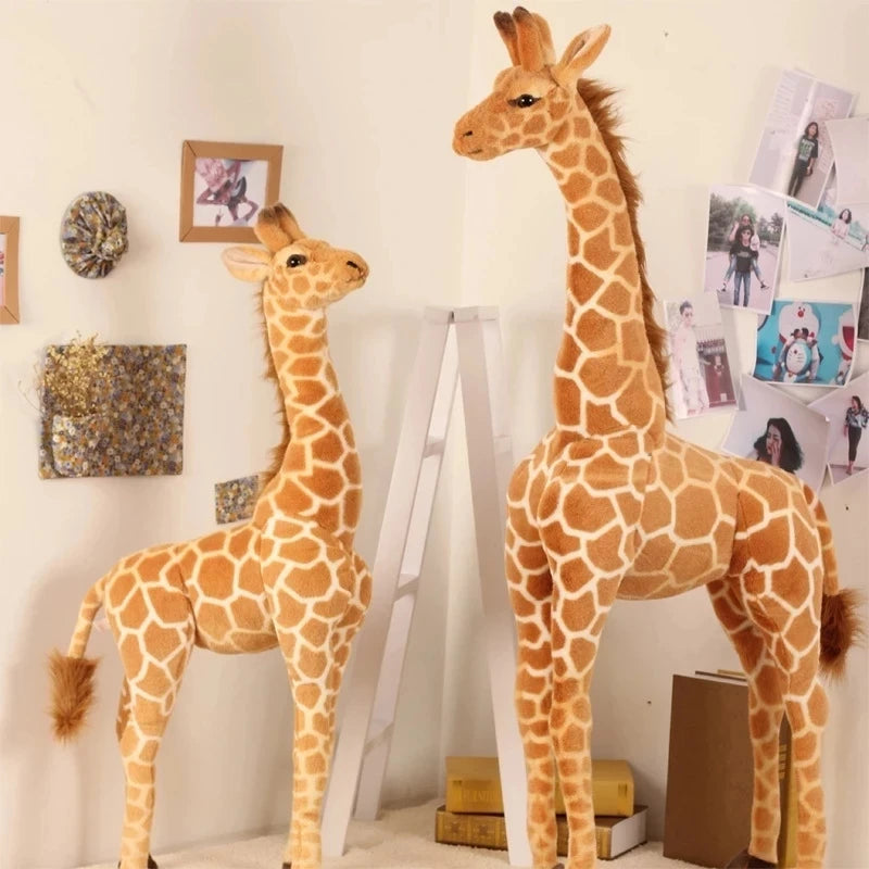 Safari Giraffe Stuffed Animal two sizes displayed beside wall photos and a white ladder.