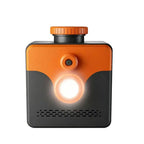 Saltwater Emergency Light single-lamp front view with orange cap, black housing and illuminated round LED