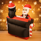 Santa Penguin Piano Inflatable viewed across the black piano, with Santa facing the penguin.
