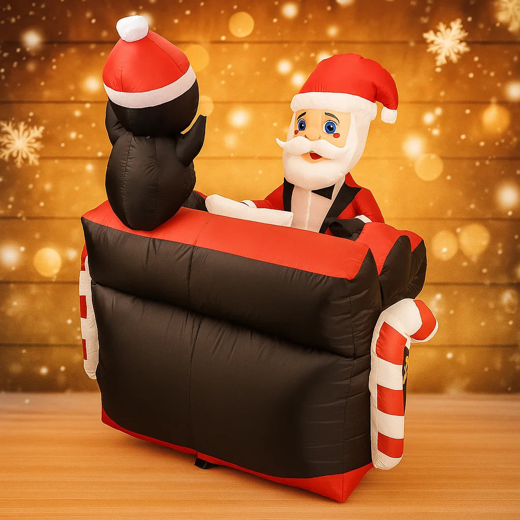 Santa Penguin Piano Inflatable viewed across the black piano, with Santa facing the penguin.