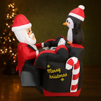 Santa Penguin Piano Inflatable indoor side view with Merry Christmas lettering and a candy-cane accent.