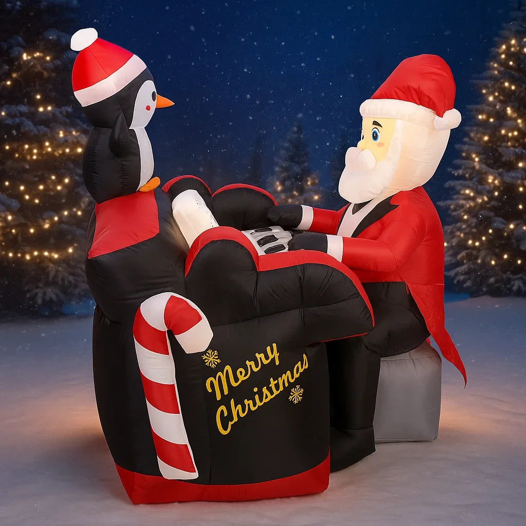 Santa Penguin Piano Inflatable displayed against snowy trees at night, with Santa seated at the keyboard.