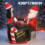 Santa Penguin Piano Inflatable side view in a snowy scene, showing Santa, penguin and candy-cane piano.