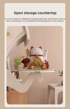 Sassy Pants Drawer Cabinet: Close-up of the side tray holding a lucky cat ornament with a supplier size label.