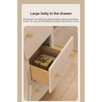 Sassy Pants Drawer Cabinet: Open wooden drawer holding a small gift box beneath gold-tone knobs.