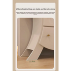 Sassy Pants Drawer Cabinet: Close view of the flared white cabinet foot with an 11.6 cm width label.