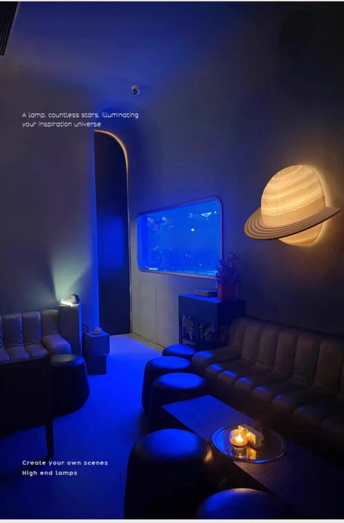 Saturn Hemisphere Wall Lamp glowing warmly in a blue-lit game and lounge room