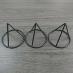 Seed Germination Racks in the black color option shown as three tapered plastic supports