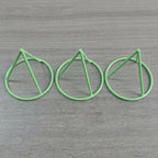 Seed Germination Racks in the green color option shown as three tapered plastic supports