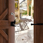 Self-Locking Gate Latch mounted on an open wooden outdoor gate with cable pull accessible