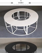 Serpentine Event Display Table round white arrangement with an open center and a partial black version below.
