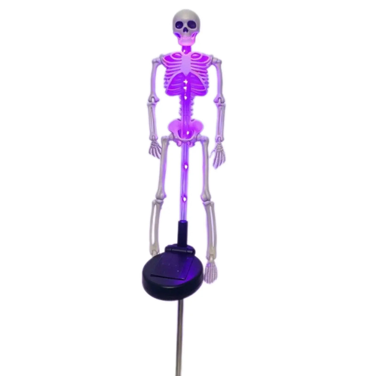 Purple-lit skeleton solar yard stake with its black solar panel on a white background