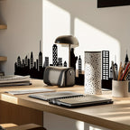 Skyline Wall Decal behind a sunlit office desk with notebooks, pencil holders and a city silhouette