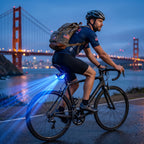 Smart LED Bike Light with blue eyes mounted beneath a cyclist’s saddle near the Golden Gate Bridge