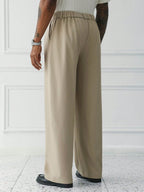Sorrento Wide Leg Trousers rear view showing the elasticized back waistband and flowing wide legs
