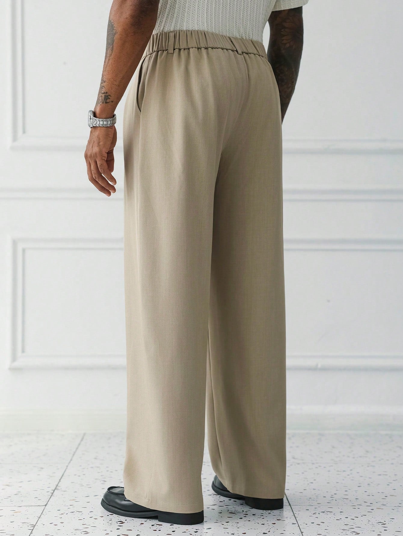 Sorrento Wide Leg Trousers rear view showing the elasticized back waistband and flowing wide legs