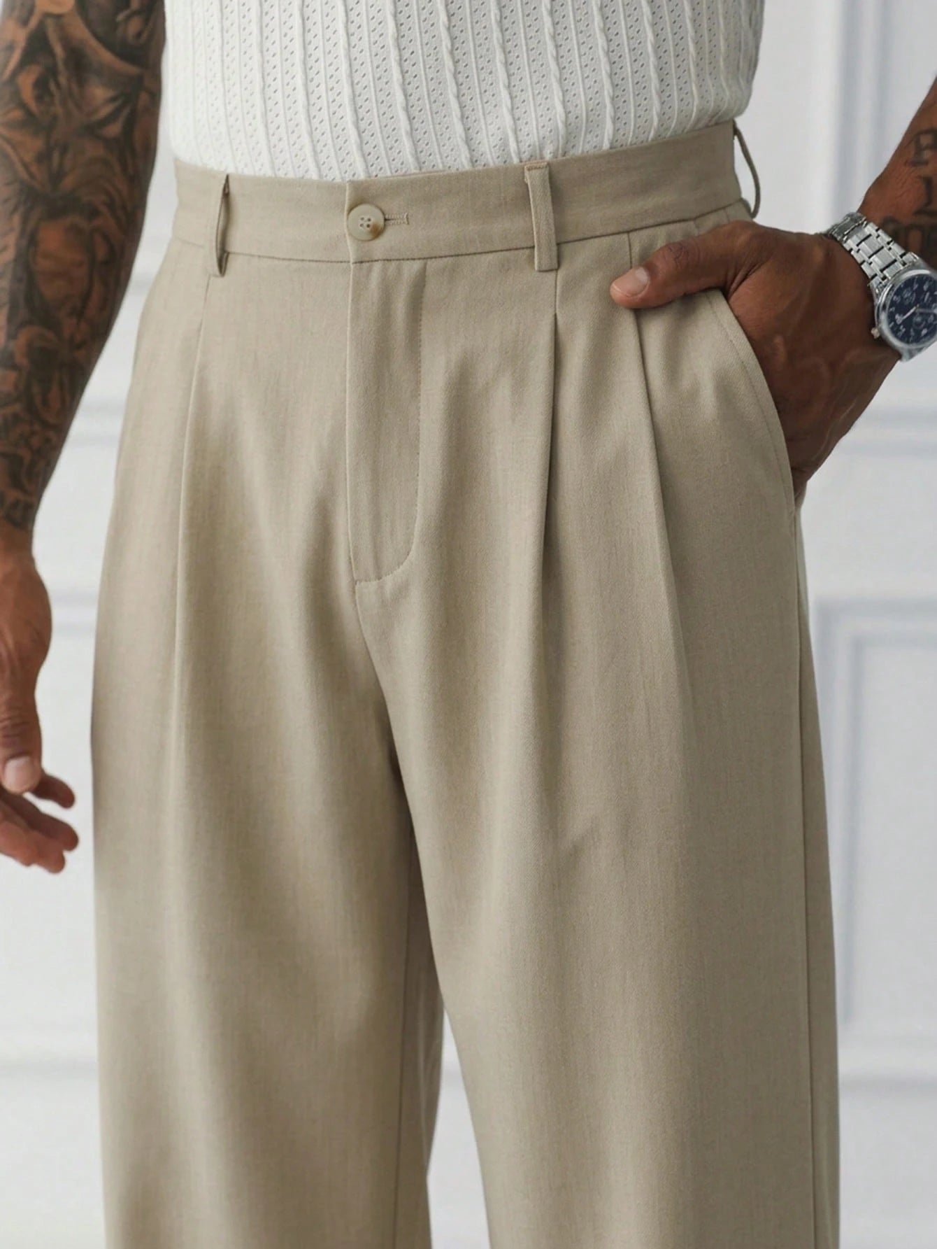 Sorrento Wide Leg Trousers close-up showing front pleats, belt loops, button closure and side pocket