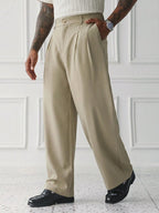 Sorrento Wide Leg Trousers worn in a three-quarter pose with front pleats, side pockets and wide legs