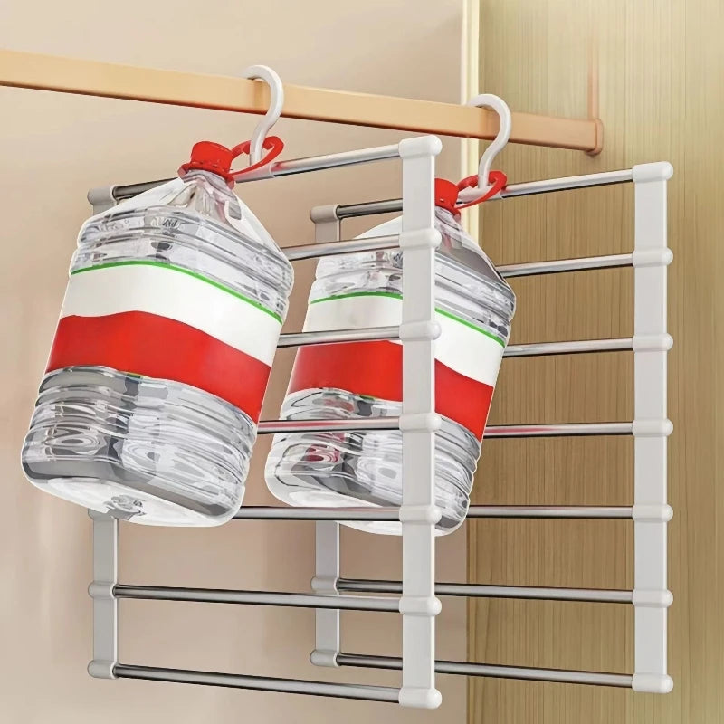 Space Saving Pants Hanger in a supplier demonstration showing water jugs suspended from two hanger hooks.
