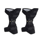 Matching black Spring Knee Support Brace pair on a white background, with upper straps crossed over fabric panels.