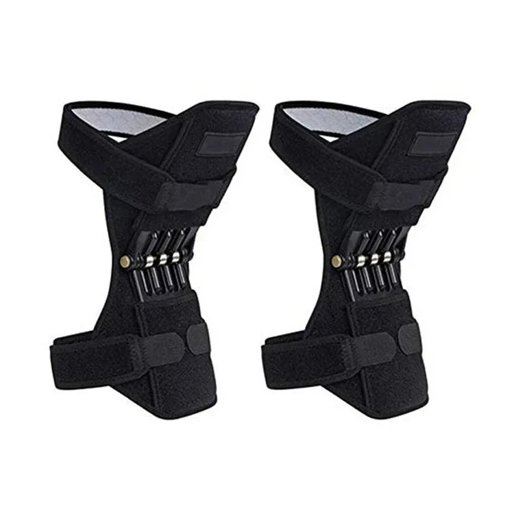 Matching black Spring Knee Support Brace pair on a white background, with upper straps crossed over fabric panels.