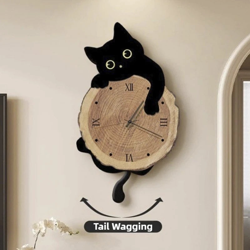 Swinging Cat Wall Clock black cat variant showing tail-wagging motion with arrows beneath the clock