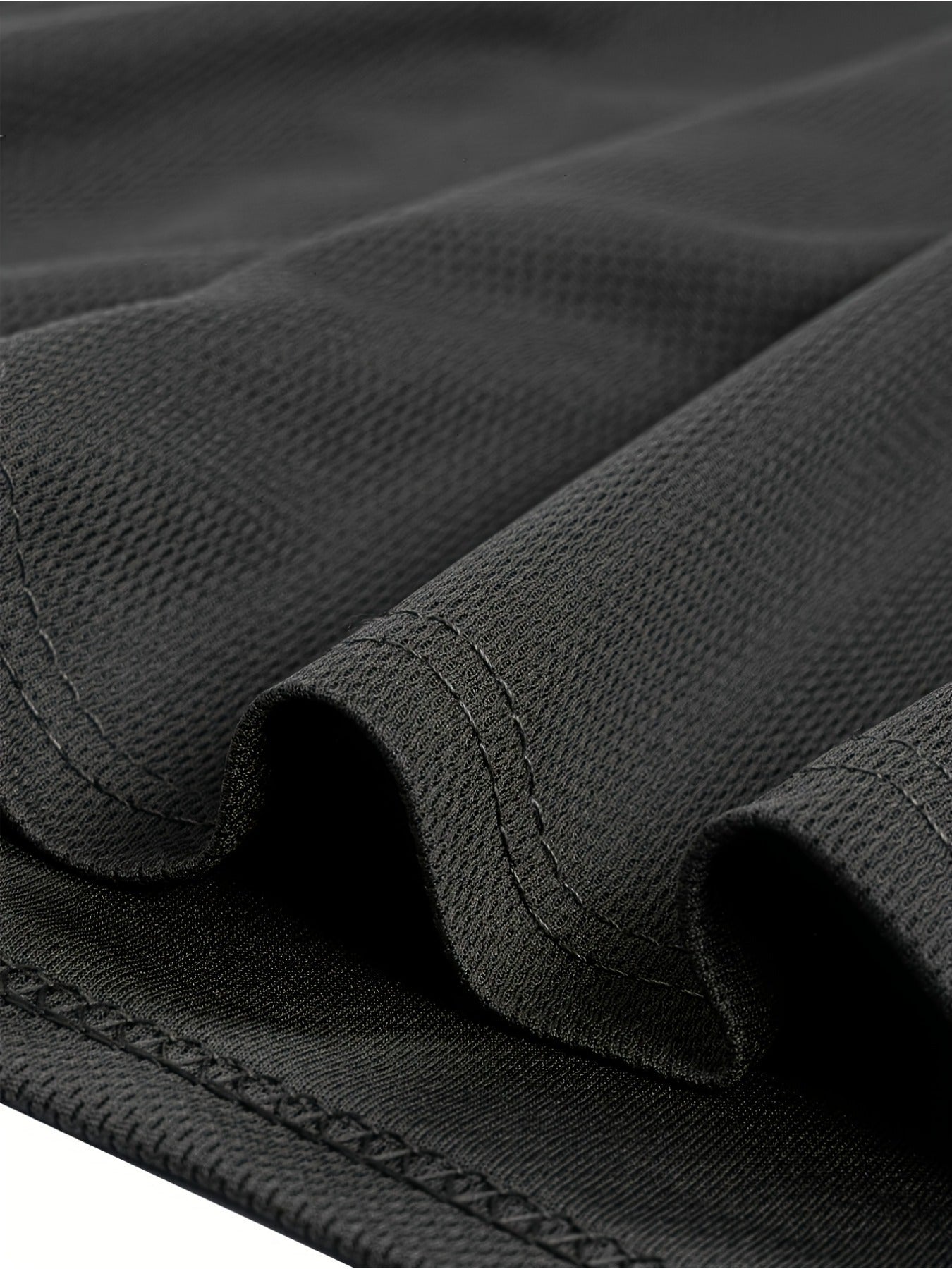 Taking Notes T-Shirt close-up showing the black short-sleeve hem and double-row stitching