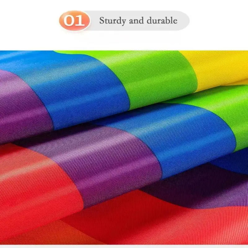 Team Building Race Mat: Folded rainbow fabric showing its woven texture and multicolored stripes.