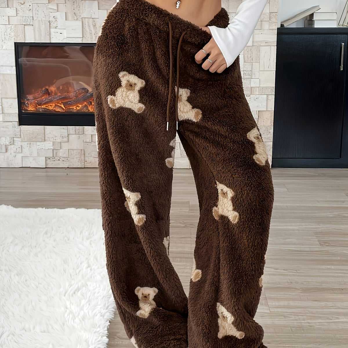 Teddy Bear Lounge Pants close-up showing cream bears, coffee-brown texture and a drawstring waist.
