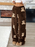 Teddy Bear Lounge Pants front view with a loose wide-leg fit and tan platform shoes.