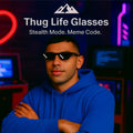 HighPeak Thug Life Glasses worn by man in blue hoodie with pixelated black lenses in neon gaming room setting