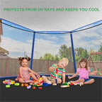 Trampoline Sun Shade Cover viewed from underneath, with three children sitting on the trampoline below.