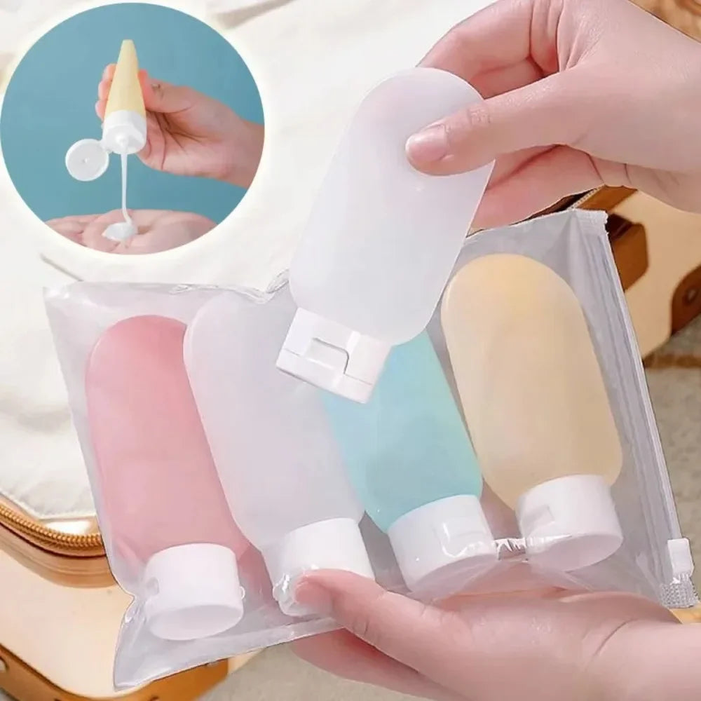 Travel Squeeze Bottle Set pastel bottles shown in a clear pouch with a handheld bottle and dispensing inset.