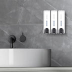 Triple Shower Dispenser White set mounted above a modern bathroom sink