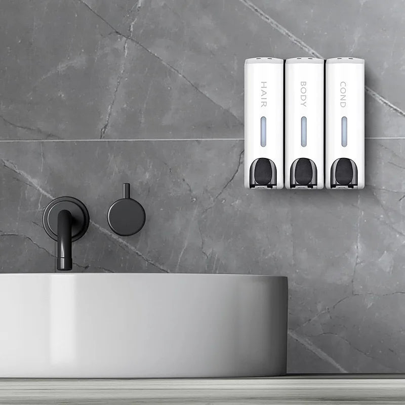 Triple Shower Dispenser White set mounted above a modern bathroom sink