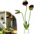 Venus Flytrap Garden Stake shown as a three-head metal yard ornament and displayed in a porch planter