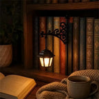 Vintage Bookshelf Lantern illuminating a cozy bookcase beside an open book, knitted blanket and mug
