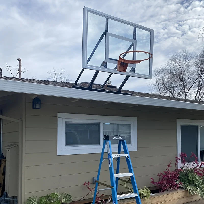 Wall-Mounted Basketball Hoop installed on an outdoor backboard above a residential garage
