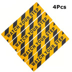 Watch Your Step Decals shown as four black-and-yellow warning strips on a white background