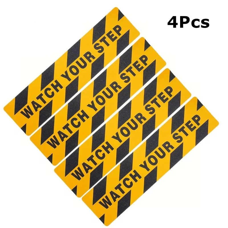Watch Your Step Decals shown as four black-and-yellow warning strips on a white background