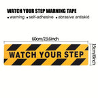 Watch Your Step Decals size guide showing a 60 x 15 cm strip with bold lettering and hazard stripes
