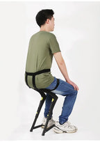 Wearable Exoskeleton Chair worn by a man seated on the deployed leg supports