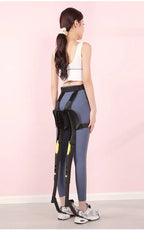 Wearable Exoskeleton Chair worn in a standing side view with the frame folded along the legs