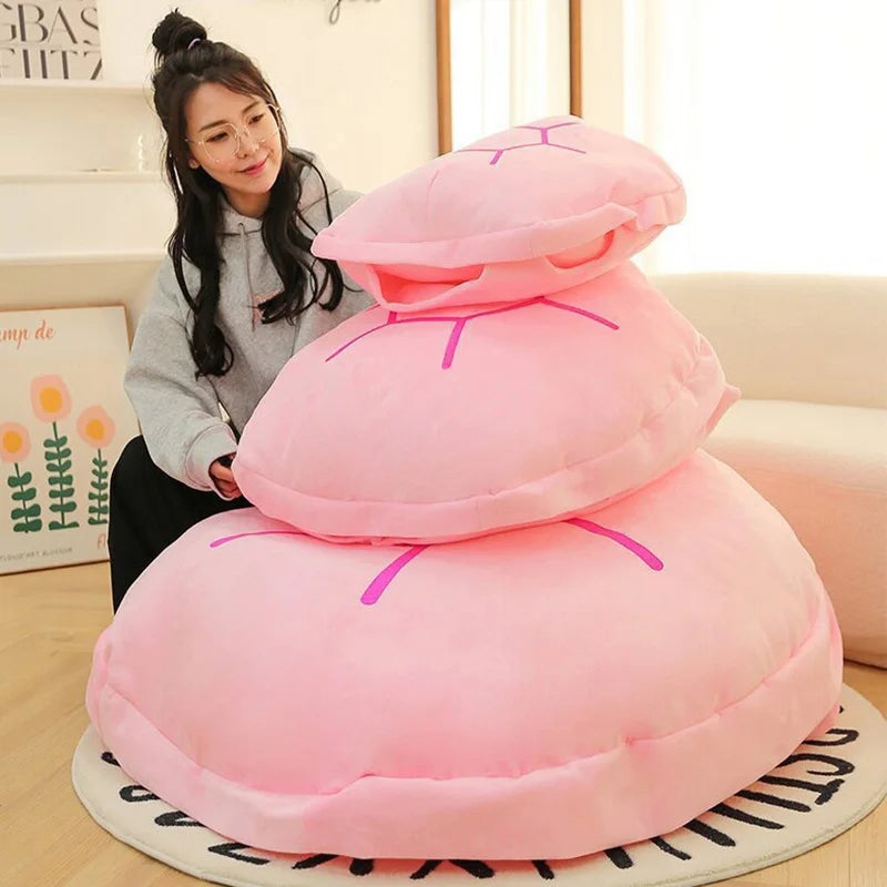 Wearable Turtle Shell Pillow in three pink sizes arranged from largest to smallest