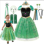 Winter Fairytale Princess Dress in Green, shown on a child beside the dress and assorted costume accessories