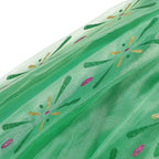 Winter Fairytale Princess Dress close-up of the green sheer skirt with pink, gold-colored and green floral motifs